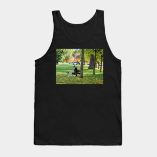 Young woman with her dog and phone in the park Tank Top